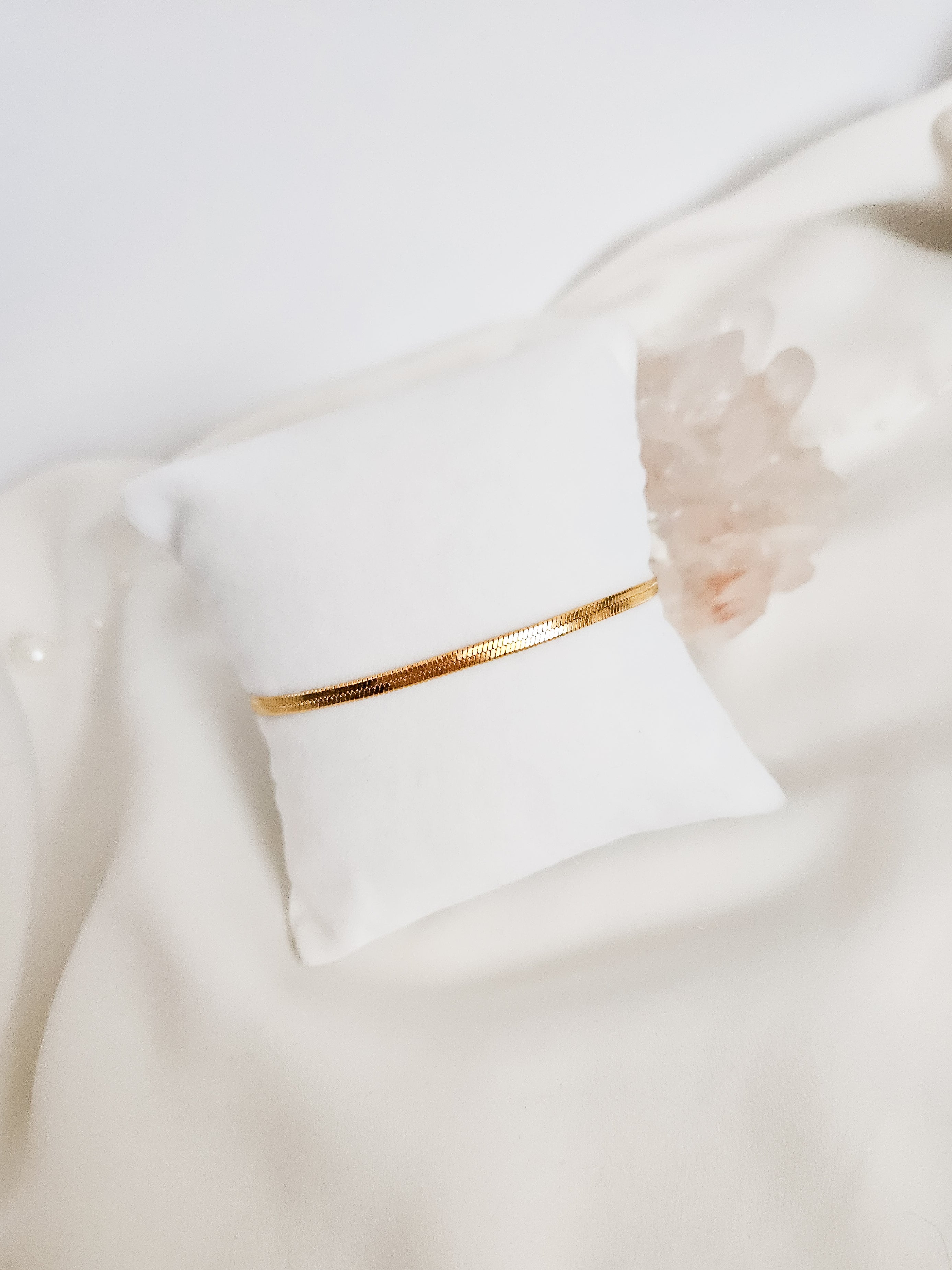 Gold herringbone bracelet