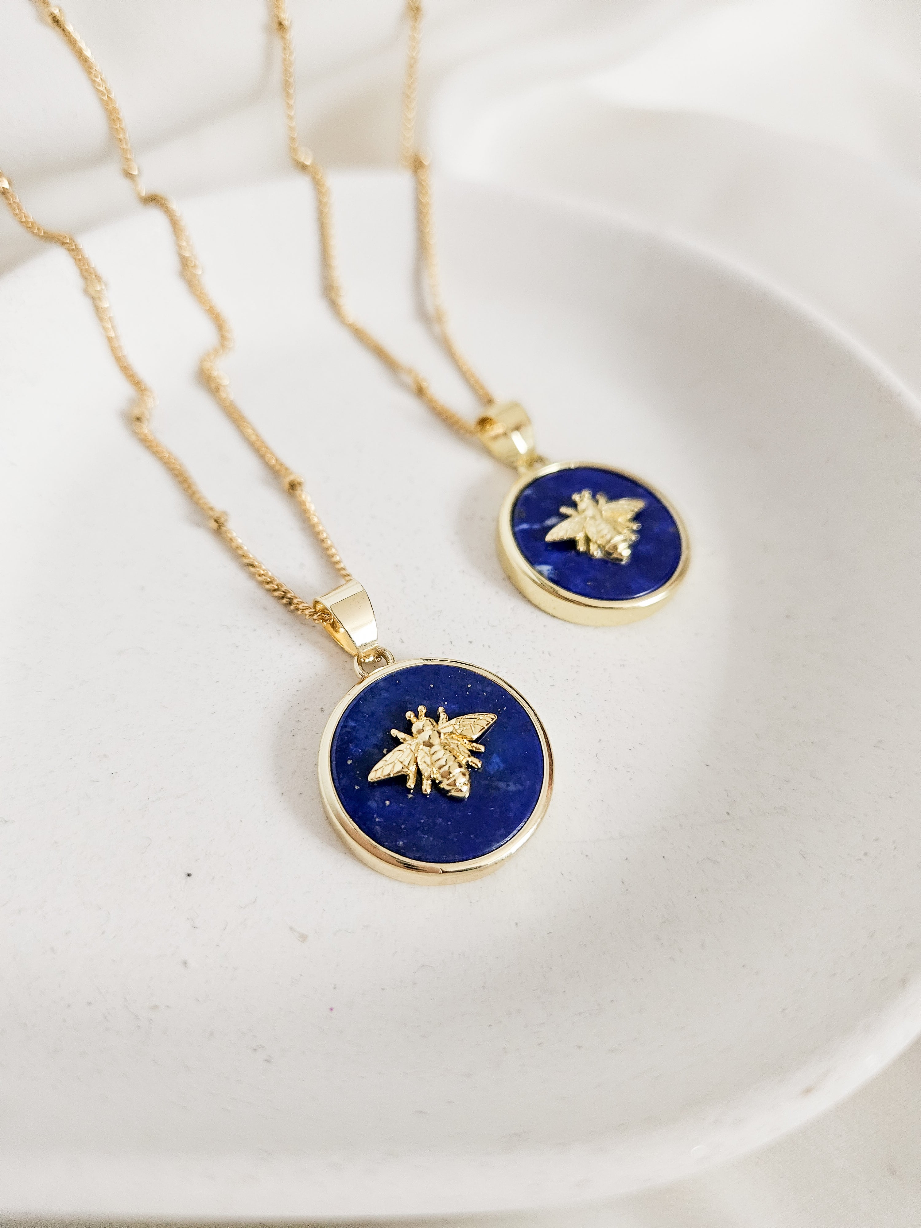 Queen Bee necklace with deep blue lapis lazuli gemstone.