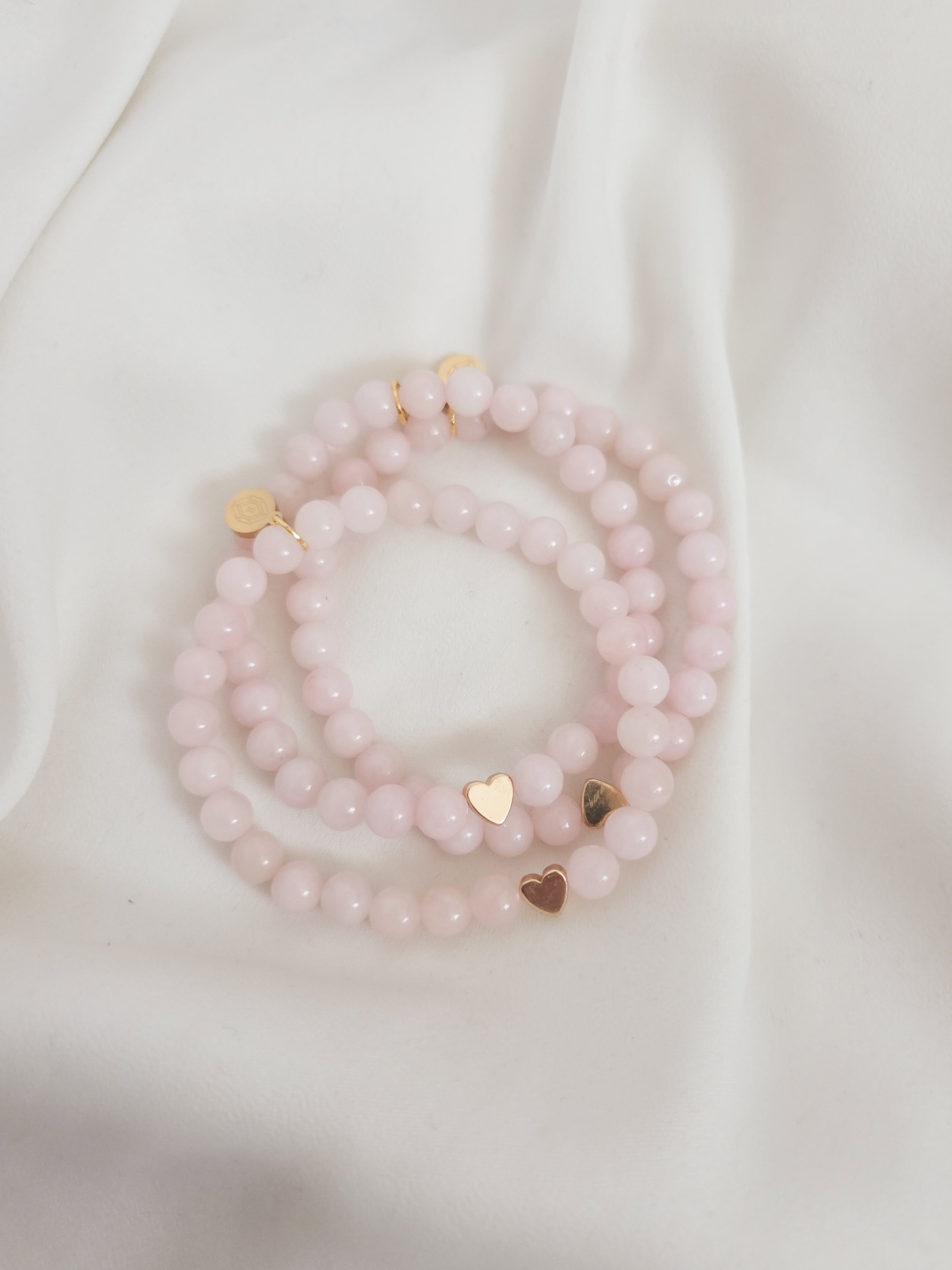 Sweet Pea bracelet with rose quartz and gold plated hematite heart detail.