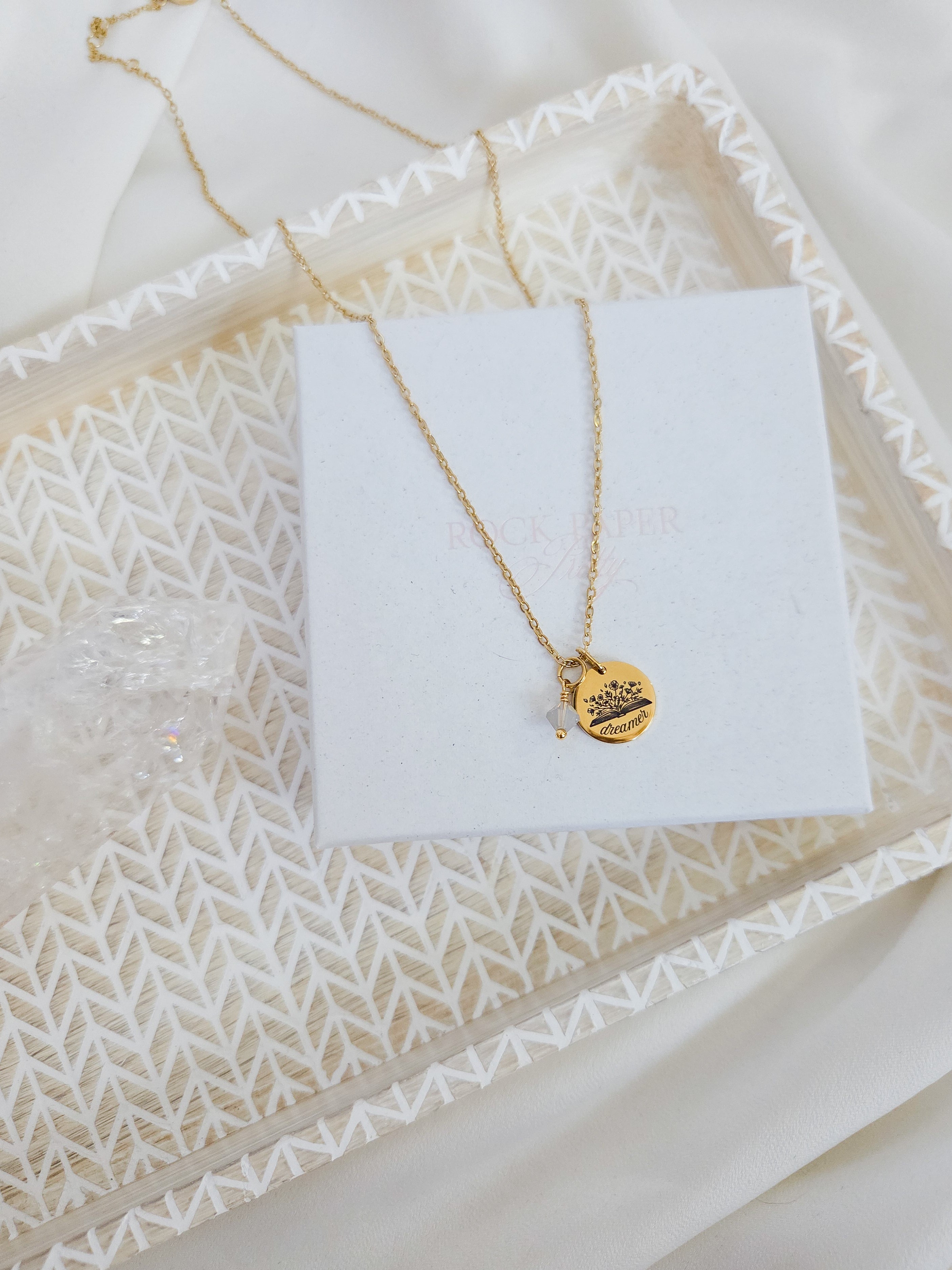 Laser engraved dreamer pendant necklace with book image and Swarovski crystal pendant necklace.