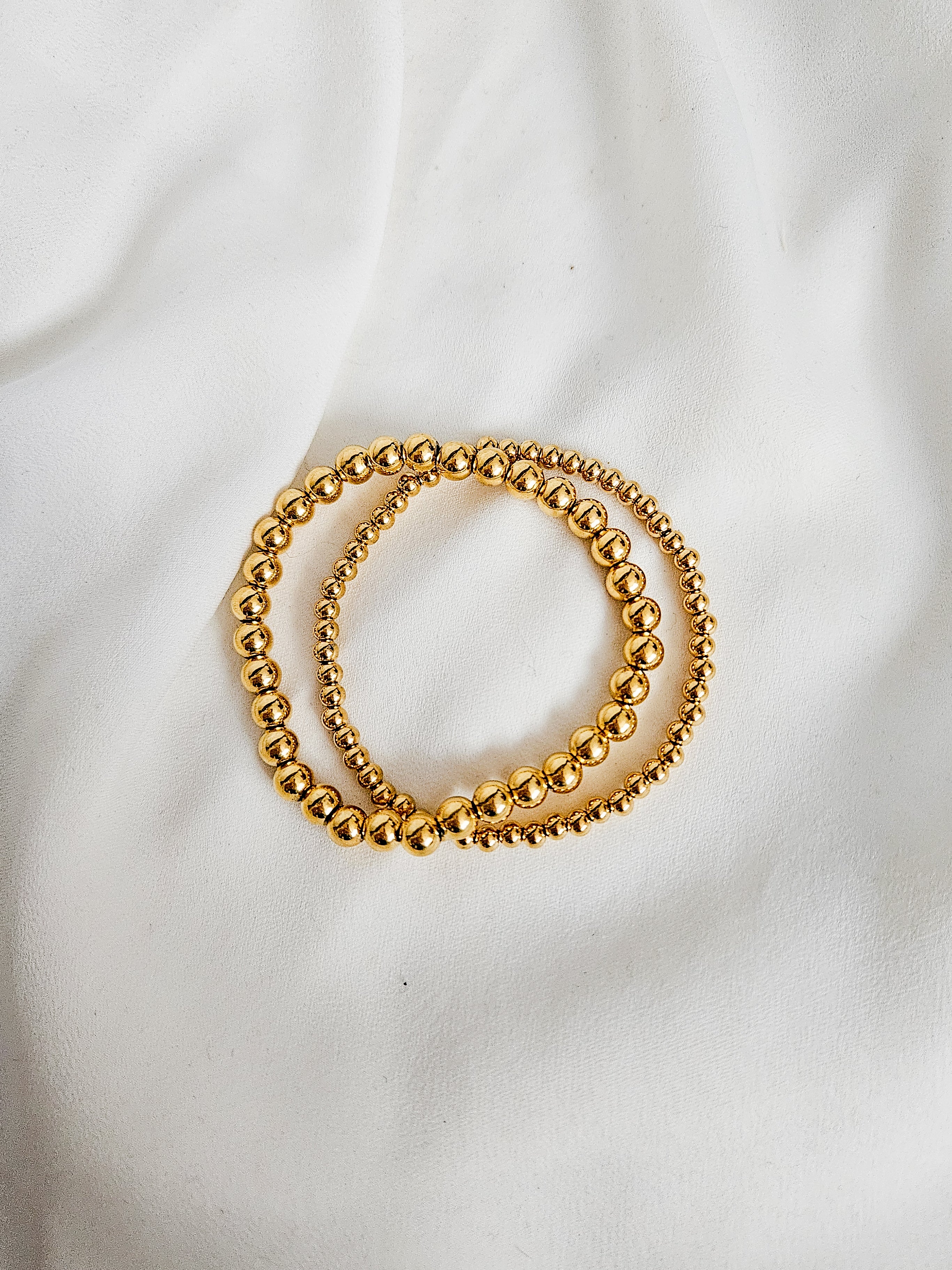 Gold beaded bracelets perfect for gifting and everyday wear.