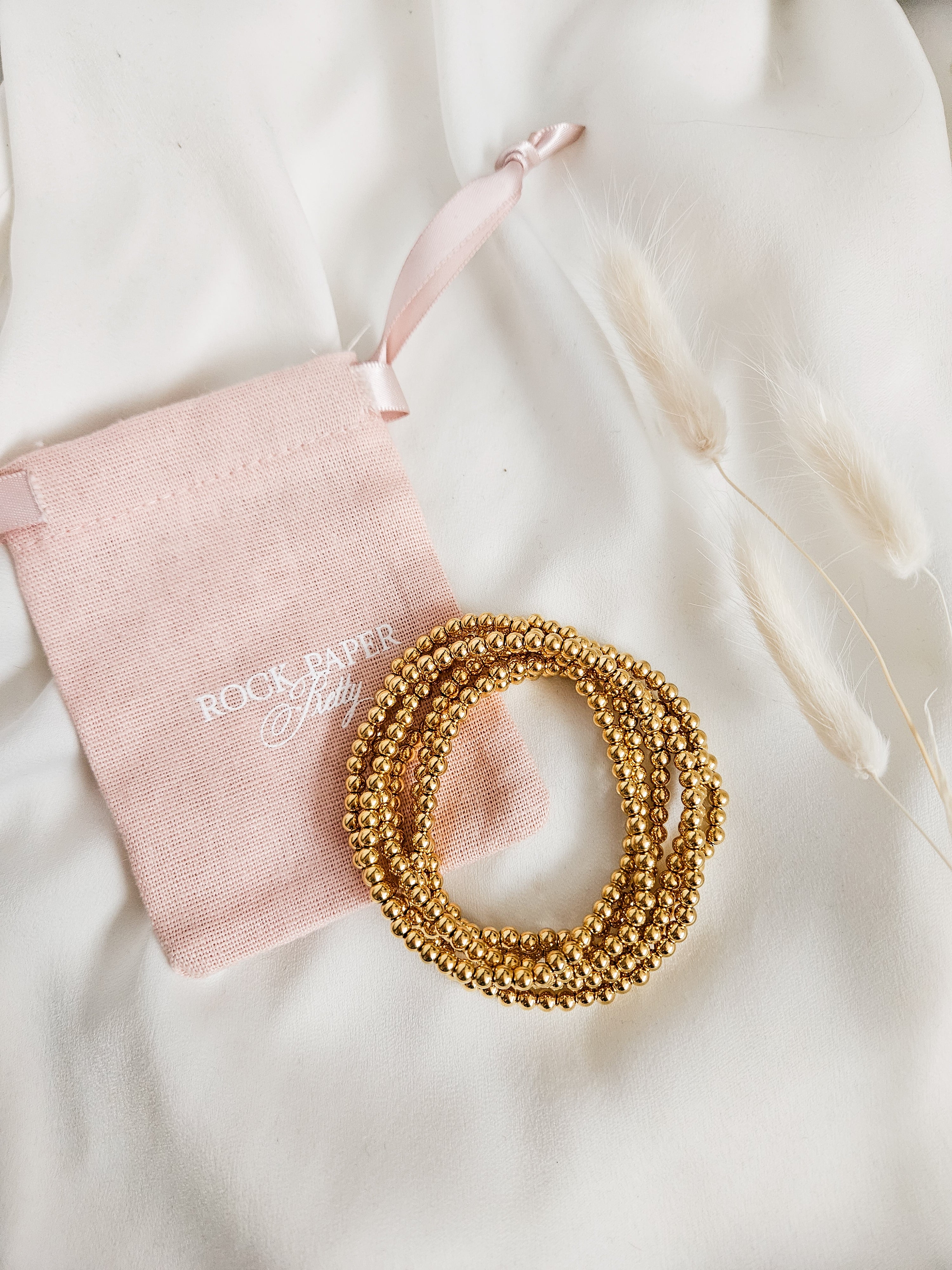 Gold PVD plated stainless steel beaded stretch bracelet for everyday wear.