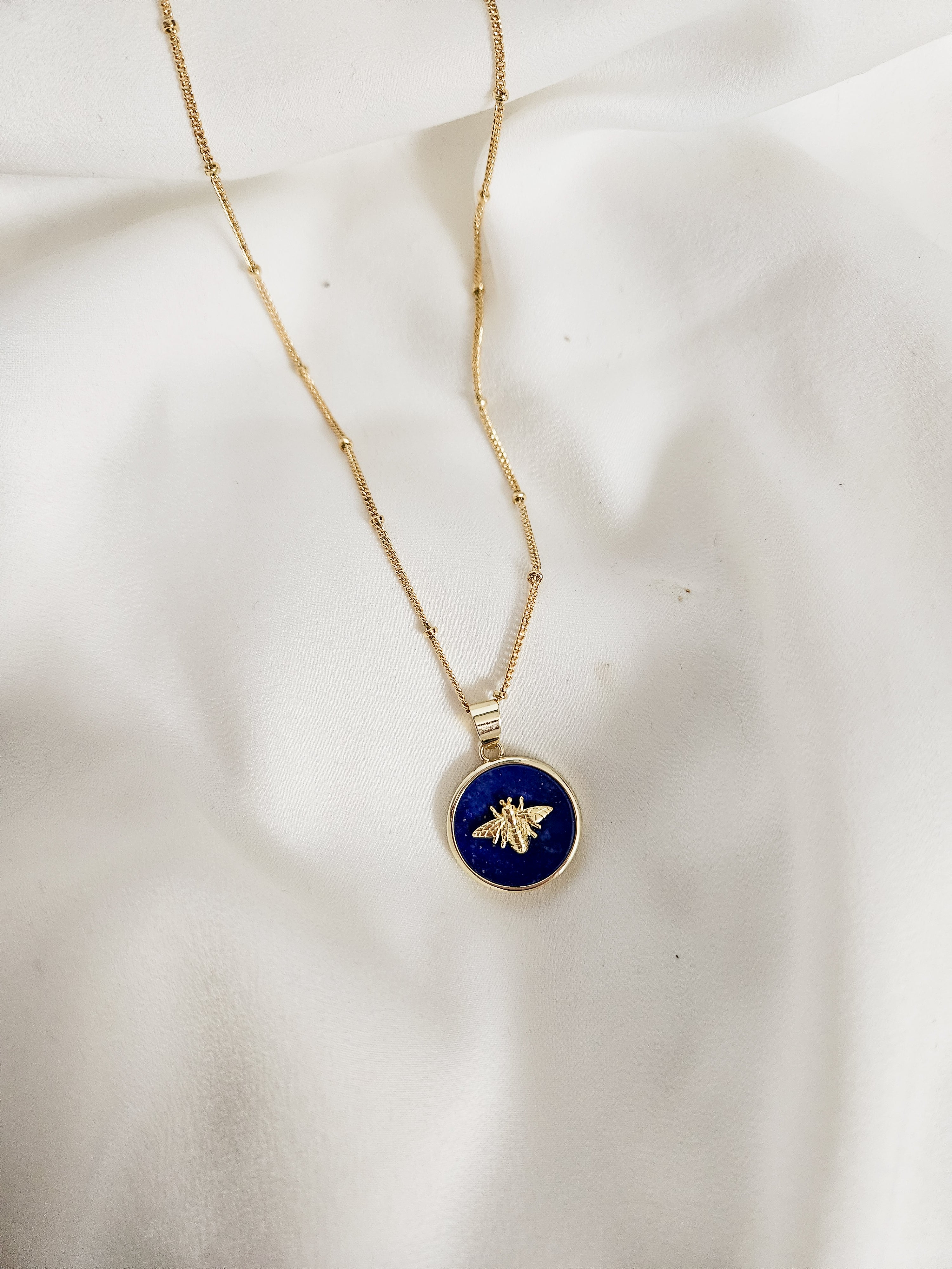 Queen Bee necklace chain detail in gold plated stainless steel.