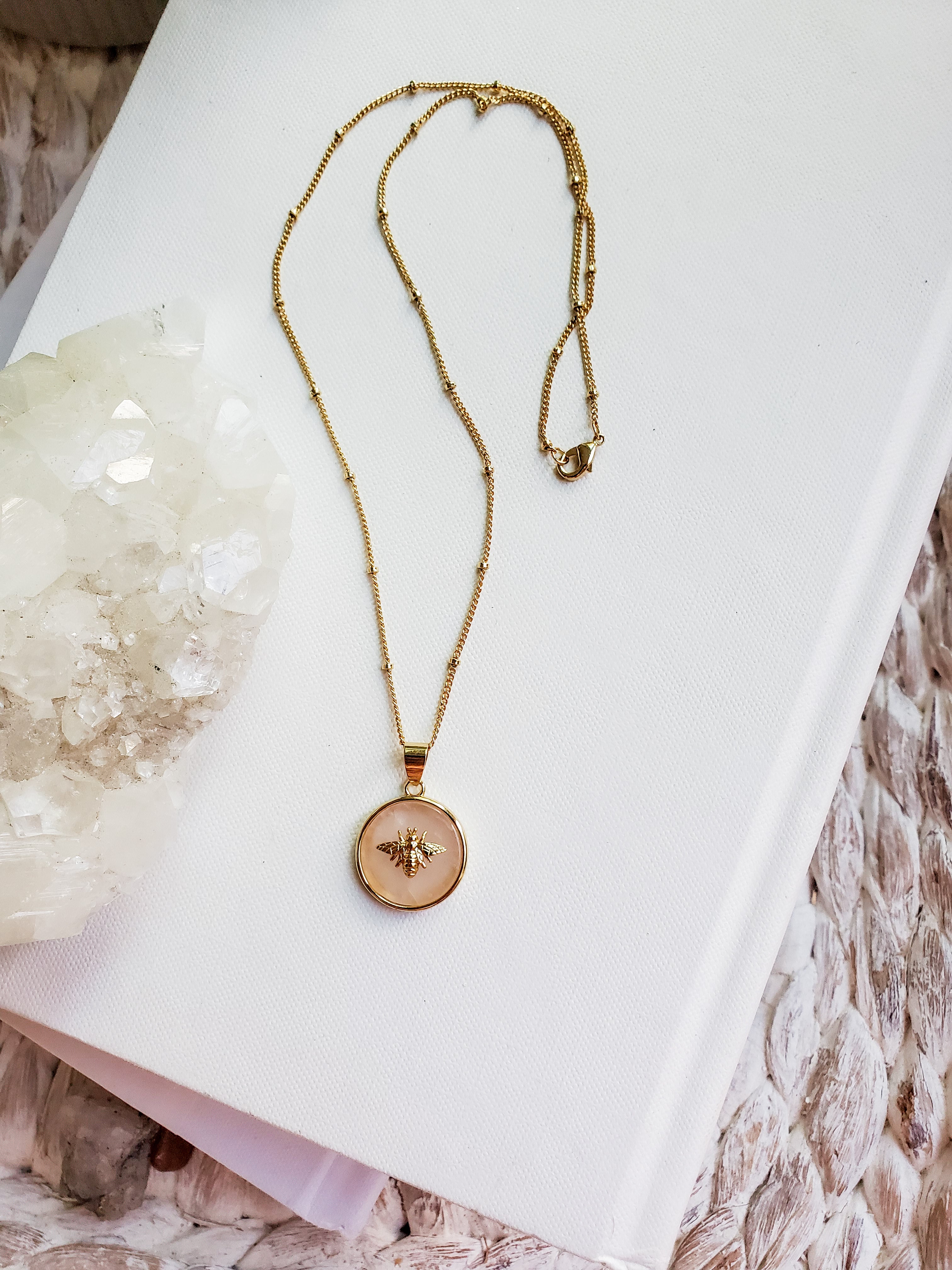 Rose quartz Queen Bee necklace with gold plated bee pendant.