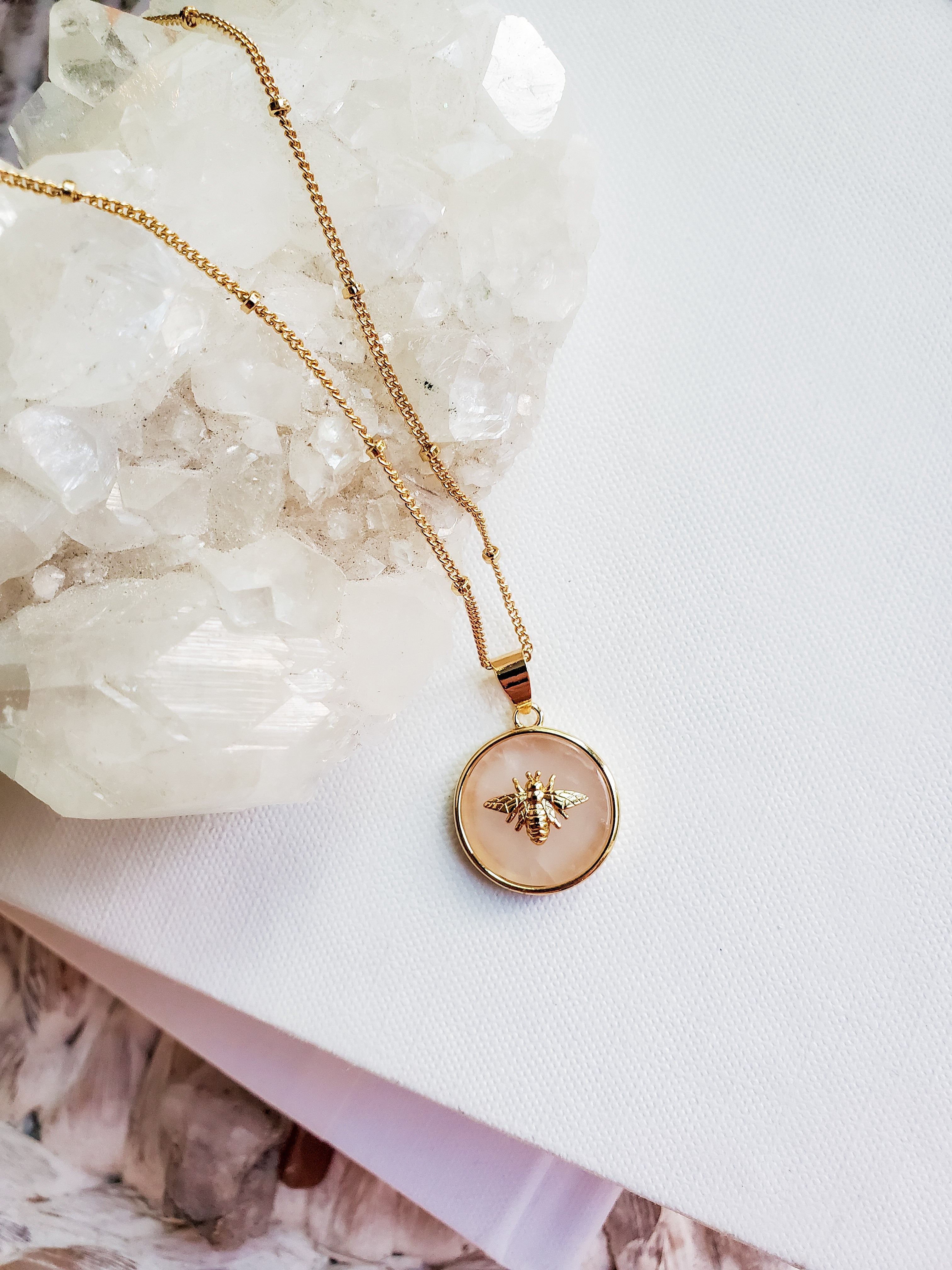Rose quartz Queen Bee necklace with gold plated bee pendant.